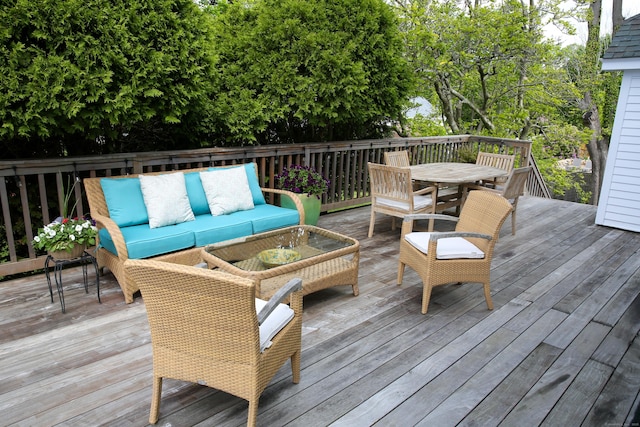 27 Church St, Groton, CT 06340 - wooden deck with an outdoor living space and outdoor dining space