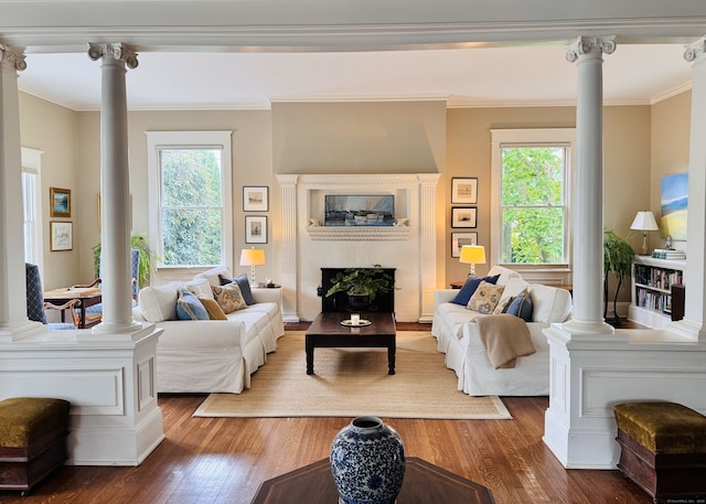 27 Church St, Groton, CT 06340 - living room with ornate columns, ornamental molding, wood finished floors, and healthy amount of natural light