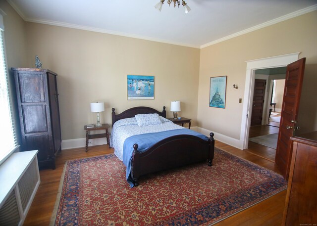 27 Church St, Groton, CT 06340 - bedroom featuring wood finished floors, ornamental molding, and radiator