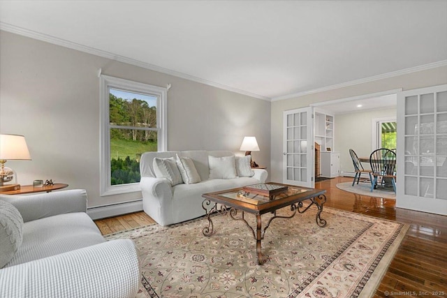 299 W Flat Hill Rd, Southbury, CT 06488 - living room featuring a baseboard radiator, crown molding, french doors, plenty of natural light, and hardwood / wood-style flooring