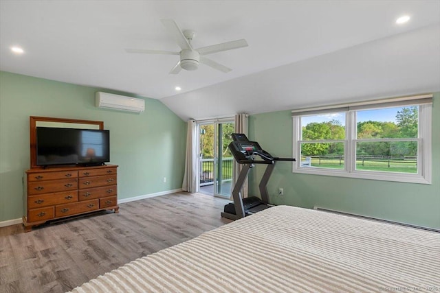 299 W Flat Hill Rd, Southbury, CT 06488 - bedroom with a wall unit AC, access to exterior, vaulted ceiling, wood finished floors, and baseboards