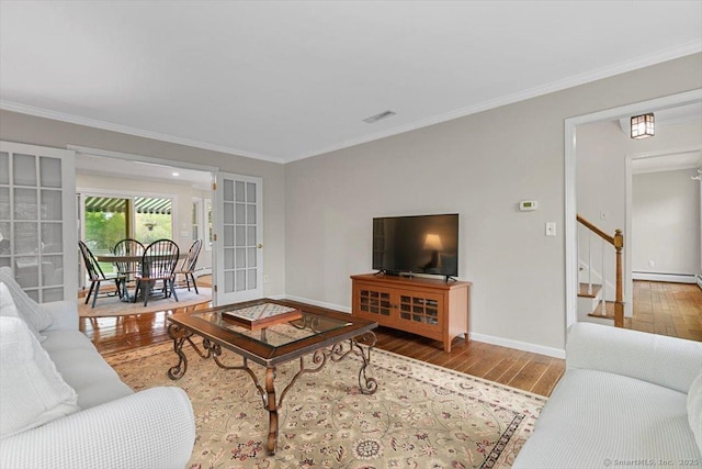 299 W Flat Hill Rd, Southbury, CT 06488 - living area with wood-type flooring, stairway, baseboards, ornamental molding, and french doors