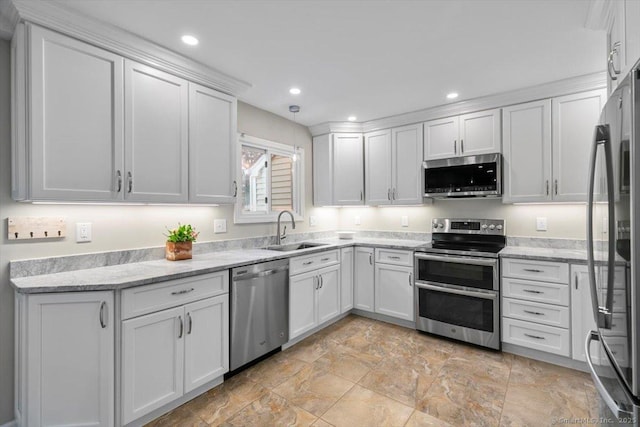 299 W Flat Hill Rd, Southbury, CT 06488 - kitchen featuring appliances with stainless steel finishes, a sink, white cabinetry, stone finish floors, and recessed lighting