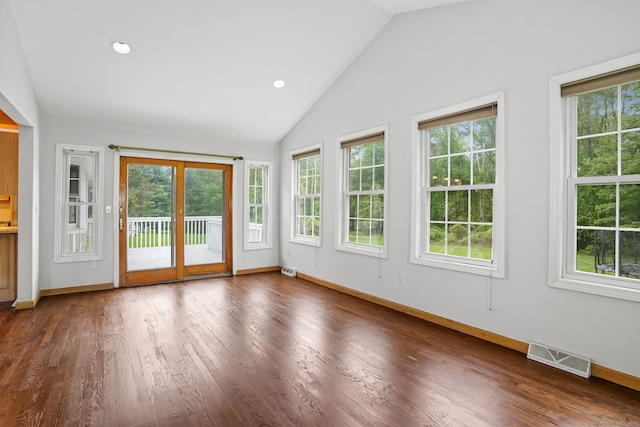 unfurnished sunroom with vaulted ceiling