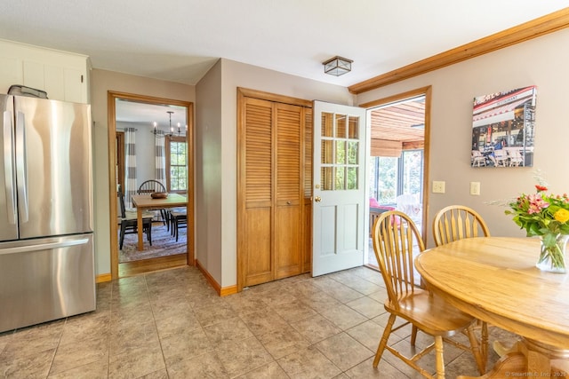 12 Sandy Ln, Marlborough, CT 06447 - dining space with healthy amount of natural light, a chandelier, and baseboards