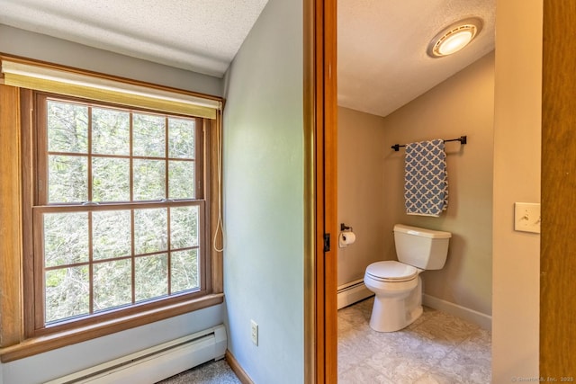 12 Sandy Ln, Marlborough, CT 06447 - bathroom with a baseboard heating unit, toilet, healthy amount of natural light, and a textured ceiling