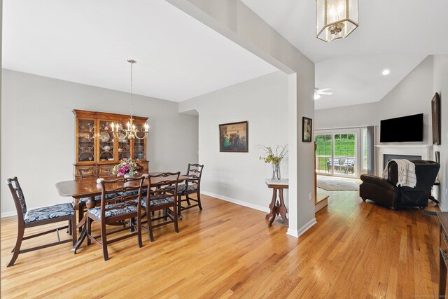 107 Chestnut Hill Rd Unit 107, Portland, CT 06480 - dining room featuring a chandelier, light wood finished floors, lofted ceiling, baseboards, and recessed lighting