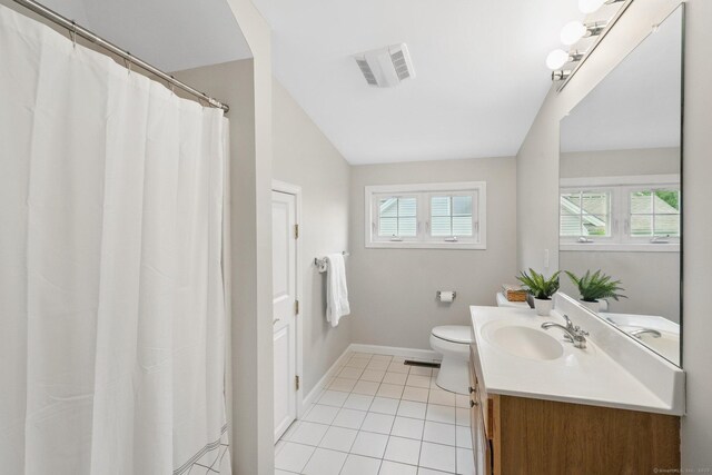 107 Chestnut Hill Rd Unit 107, Portland, CT 06480 - bathroom with vanity, toilet, baseboards, tile patterned floors, and lofted ceiling
