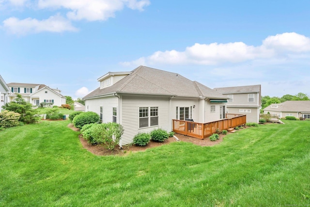 107 Chestnut Hill Rd Unit 107, Portland, CT 06480 - rear view of property featuring a deck, a lawn, and roof with shingles