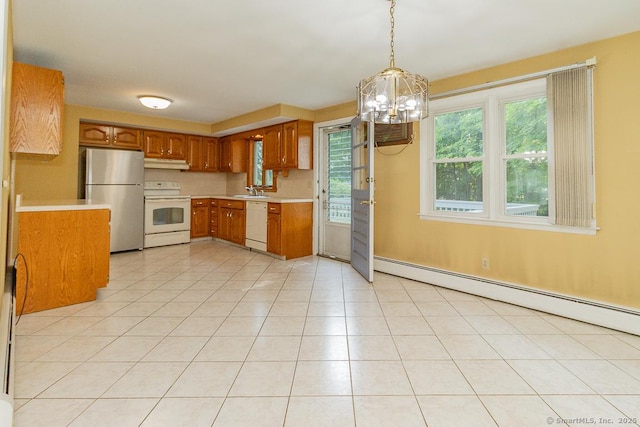 123 Jeffrey Ln, Newington, CT 06111 - kitchen featuring white appliances, light countertops, brown cabinets, a baseboard heating unit, and a chandelier