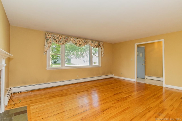 123 Jeffrey Ln, Newington, CT 06111 - unfurnished living room featuring baseboard heating, light wood-type flooring, baseboards, and a fireplace