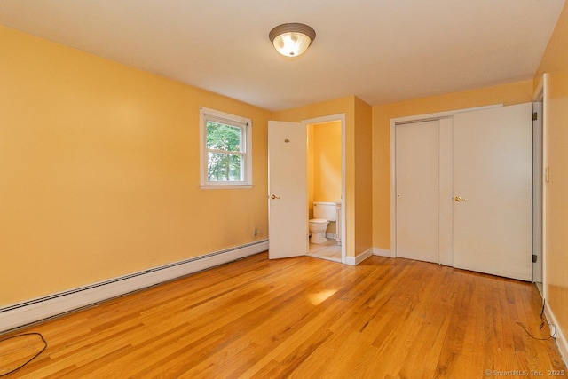 123 Jeffrey Ln, Newington, CT 06111 - unfurnished bedroom with light wood-style flooring, a baseboard radiator, a closet, and baseboards
