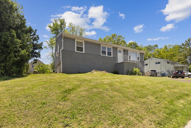 26 Carroll Rd, Hamden, CT 06517 - ranch-style home featuring brick siding and a front lawn