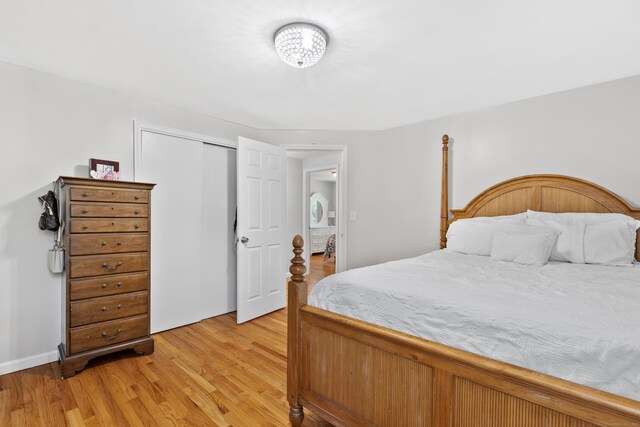 26 Carroll Rd, Hamden, CT 06517 - bedroom featuring light wood-style flooring and a closet