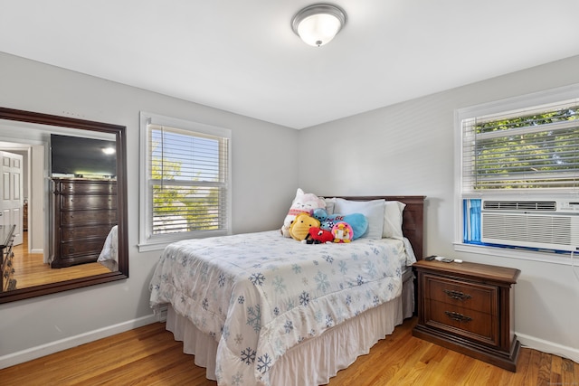 26 Carroll Rd, Hamden, CT 06517 - bedroom featuring light wood-type flooring, baseboards, and cooling unit