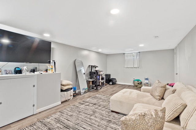 26 Carroll Rd, Hamden, CT 06517 - living area featuring light wood-style floors, recessed lighting, and baseboards