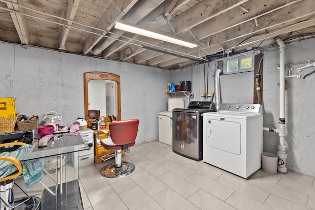 26 Carroll Rd, Hamden, CT 06517 - laundry area with separate washer and dryer and light tile patterned floors