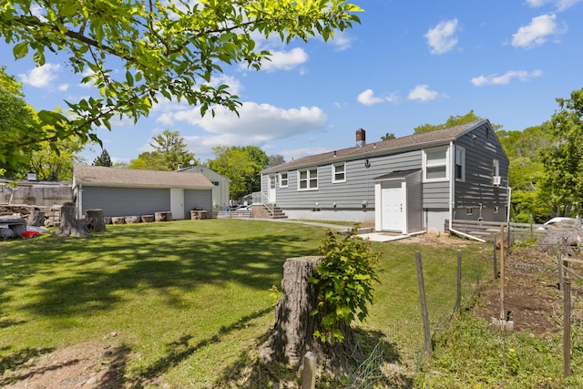 26 Carroll Rd, Hamden, CT 06517 - rear view of property with a chimney