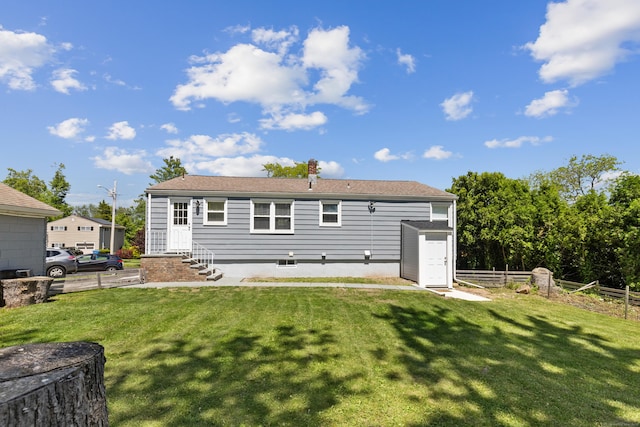 26 Carroll Rd, Hamden, CT 06517 - back of house featuring a chimney