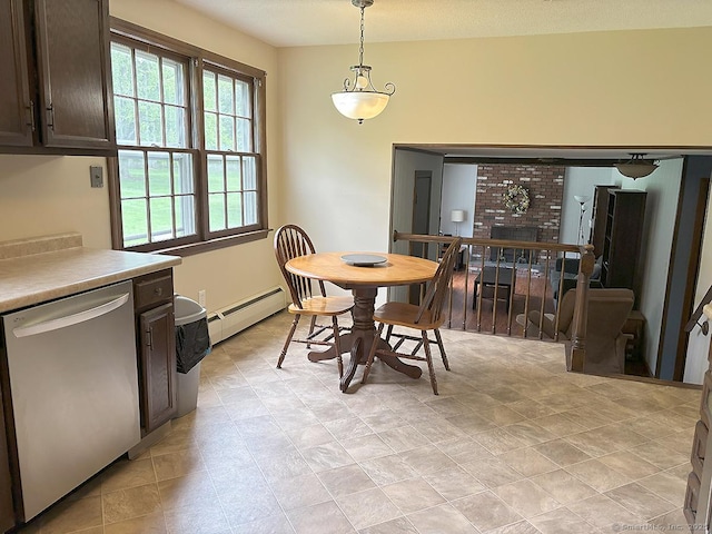 207 Pheasant Dr, Rocky Hill, CT 06067 - dining area with baseboard heating and a brick fireplace