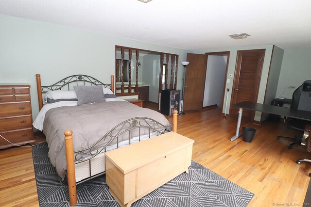 207 Pheasant Dr, Rocky Hill, CT 06067 - bedroom featuring wood finished floors