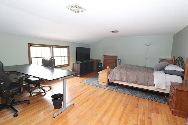 207 Pheasant Dr, Rocky Hill, CT 06067 - bedroom featuring wood finished floors, a desk, and lofted ceiling