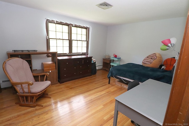 207 Pheasant Dr, Rocky Hill, CT 06067 - bedroom with light wood finished floors and baseboard heating