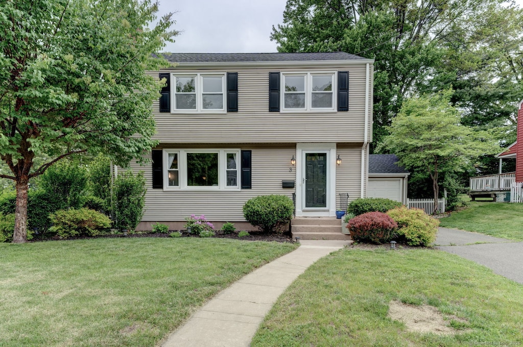 3 Harvard Rd, Manchester, CT 06042 - colonial home with a front lawn and asphalt driveway
