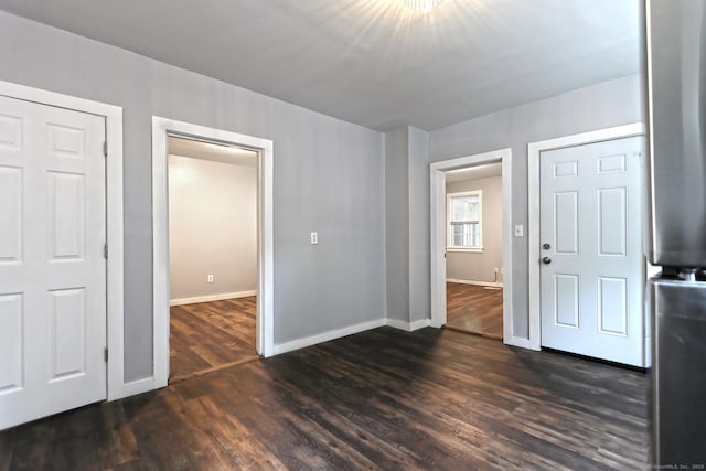 212 Newhall St, New Haven, CT 06511 - empty room featuring baseboards and dark wood-type flooring