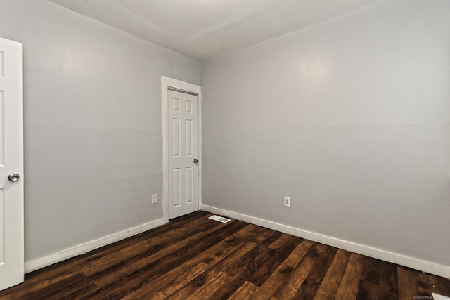 212 Newhall St, New Haven, CT 06511 - unfurnished room with baseboards and dark wood-type flooring