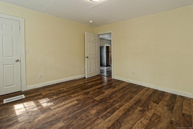 212 Newhall St, New Haven, CT 06511 - empty room featuring dark wood finished floors and baseboards