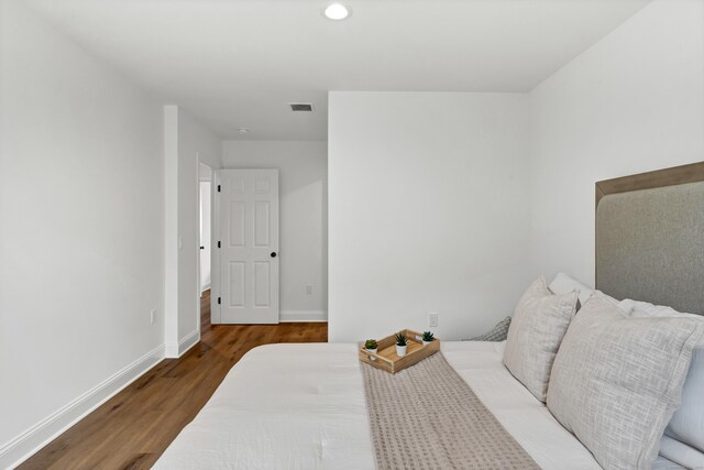 33 Main St Unit 1, Meriden, CT 06451 - bedroom with wood finished floors, baseboards, and recessed lighting