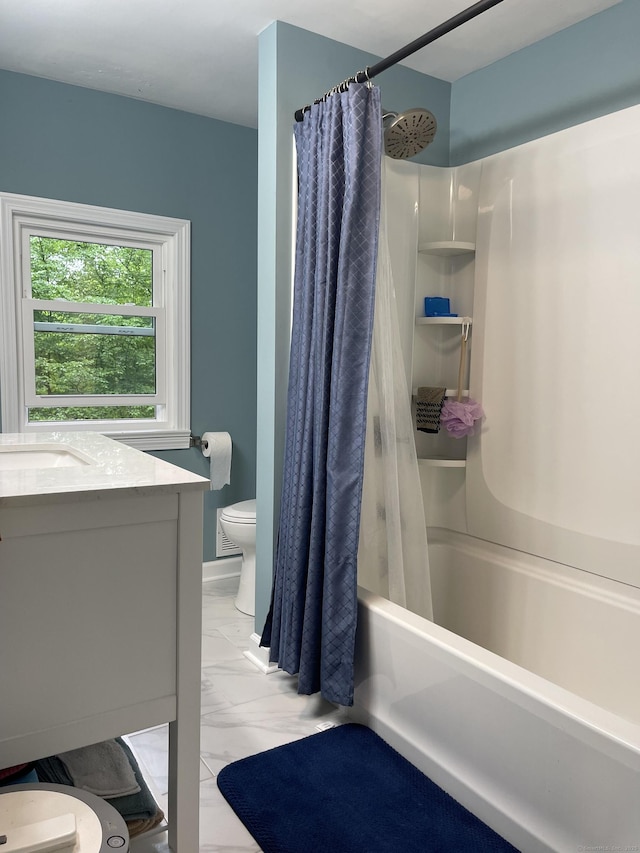 bathroom with toilet, marble finish floors, shower / tub combo with curtain, and vanity