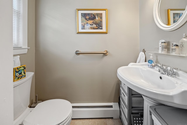 91 Parklawn Dr, Waterbury, CT 06708 - bathroom featuring baseboard heating, toilet, and tile patterned floors