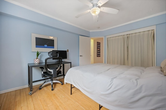 7 4th St Unit 1C, Stamford, CT 06905 - bedroom with light wood-style floors, ornamental molding, a ceiling fan, baseboards, and a desk