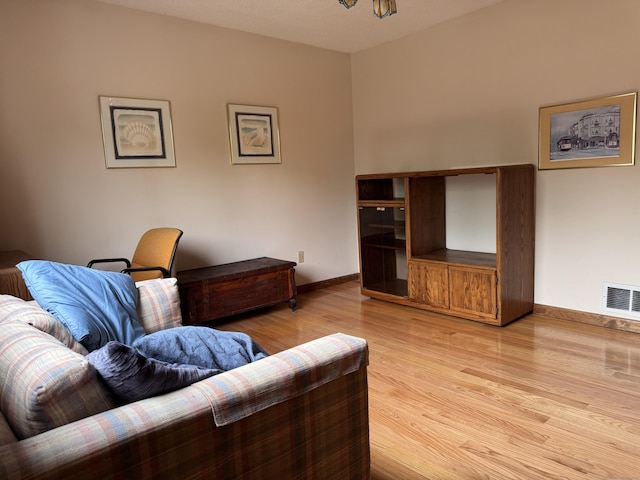 227 Twin Lakes Rd Apt C, North Branford, CT 06471 - living area with light wood-style flooring and baseboards