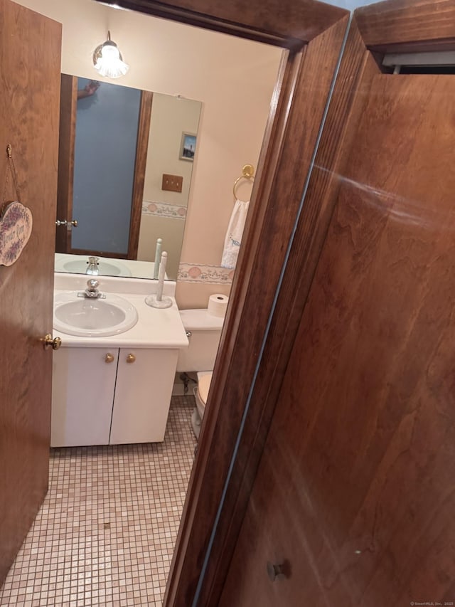 227 Twin Lakes Rd Apt C, North Branford, CT 06471 - bathroom featuring toilet and vanity