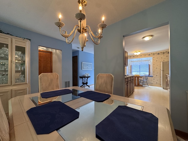 227 Twin Lakes Rd Apt C, North Branford, CT 06471 - dining room with a chandelier