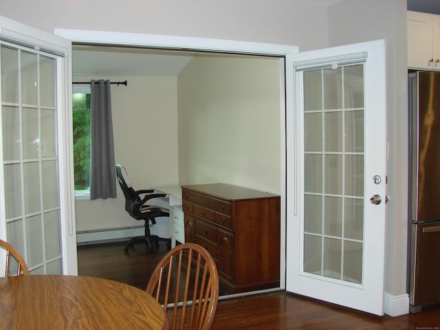 566 Savoy St, Bridgeport, CT 06606 - office area with dark wood-style floors, a baseboard radiator, and baseboards