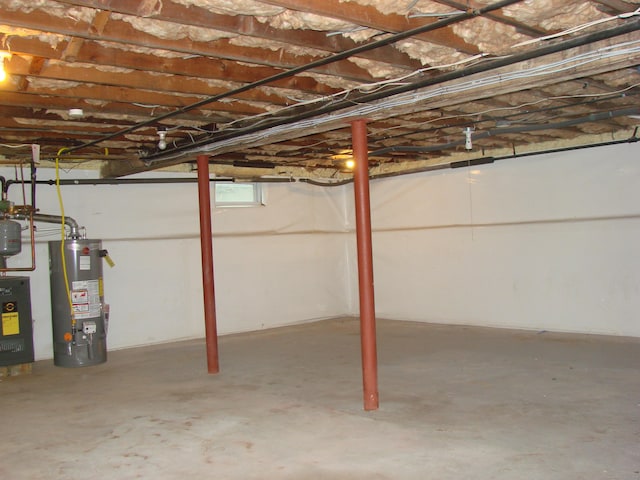 566 Savoy St, Bridgeport, CT 06606 - below grade area with water heater and a heating unit