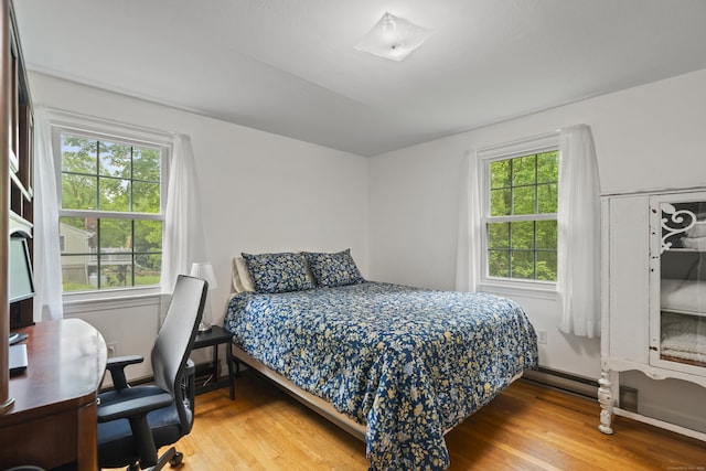 134 W Lake Ave, Guilford, CT 06437 - bedroom featuring wood finished floors and multiple windows