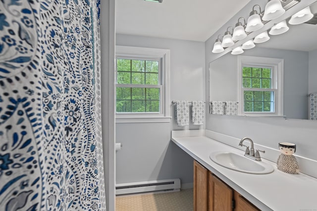 134 W Lake Ave, Guilford, CT 06437 - bathroom with a baseboard radiator, healthy amount of natural light, vanity, and curtained shower