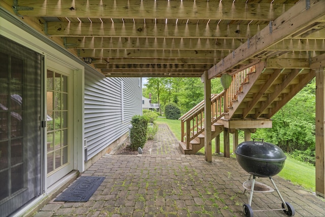 134 W Lake Ave, Guilford, CT 06437 - view of patio / terrace with stairway and a grill