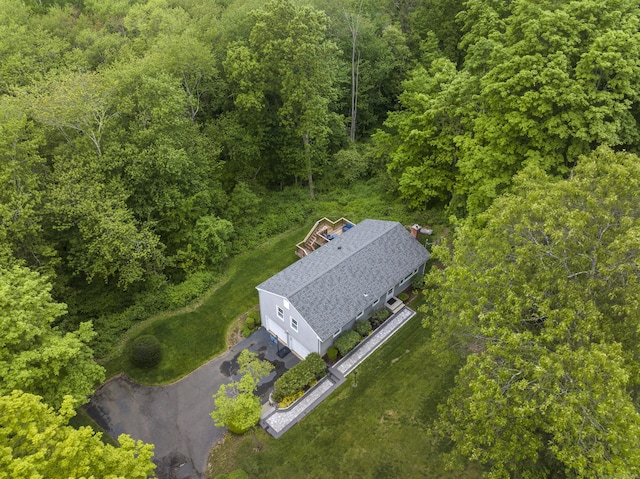 134 W Lake Ave, Guilford, CT 06437 - aerial view of property and surrounding area with a heavily wooded area
