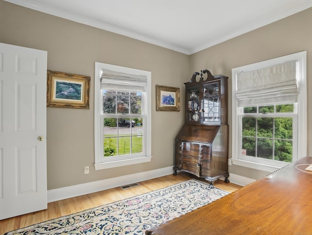 28 Eagle Dr, Fairfield, CT 06825 - home office with wood finished floors, plenty of natural light, crown molding, and baseboards