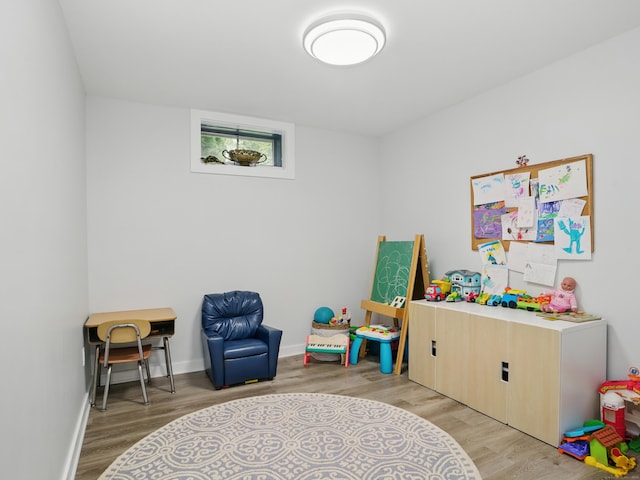 28 Eagle Dr, Fairfield, CT 06825 - playroom with light wood finished floors and baseboards