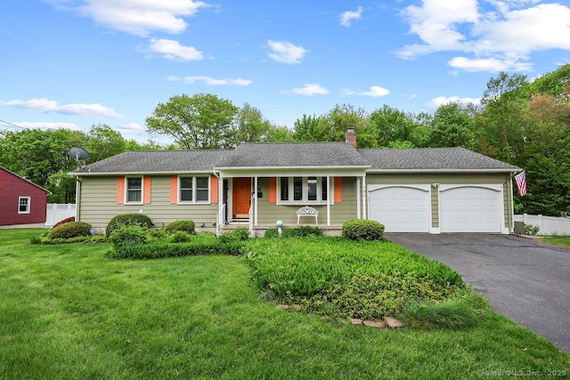 154 Sims Rd, Bristol, CT 06010 - ranch-style home with driveway, an attached garage, and a chimney