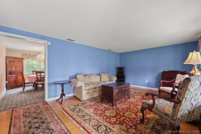 154 Sims Rd, Bristol, CT 06010 - living area with baseboards and wood finished floors