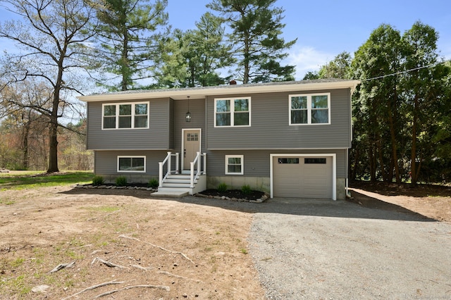 132 Bailey Pond Rd, Voluntown, CT 06384 - raised ranch featuring driveway and a garage