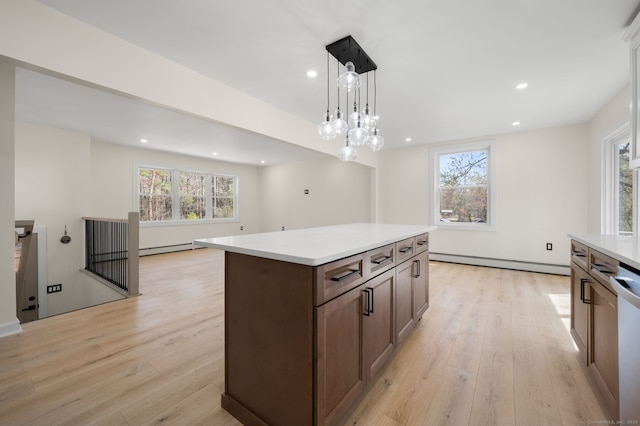 132 Bailey Pond Rd, Voluntown, CT 06384 - kitchen featuring baseboard heating, light wood-style floors, light countertops, recessed lighting, and decorative light fixtures